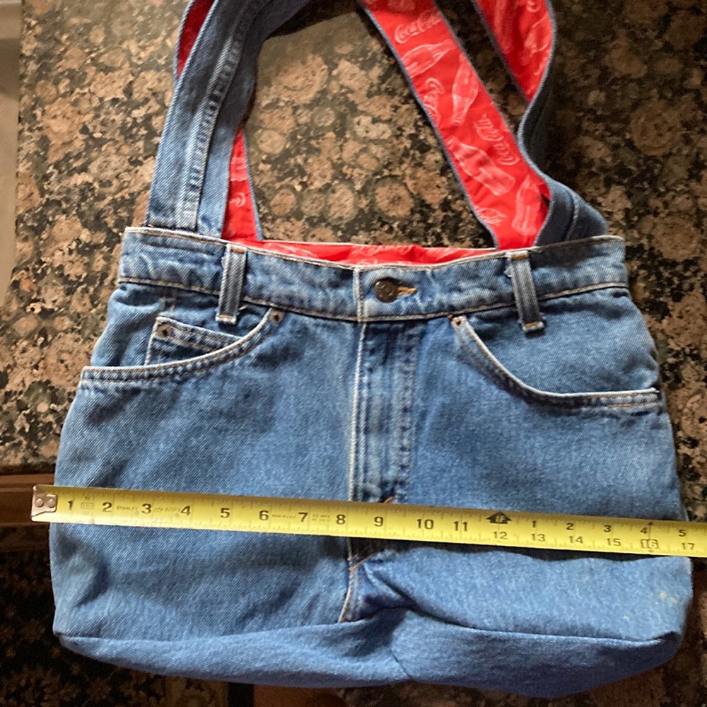 Handmade one-of-a-kind blue jean handbag or book bag.